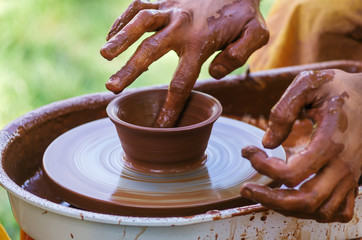 Master class on pottery, a close-up / The picture was taken in Russia, in the city of Orenburg, at the fair of the historical reconstruction festival 