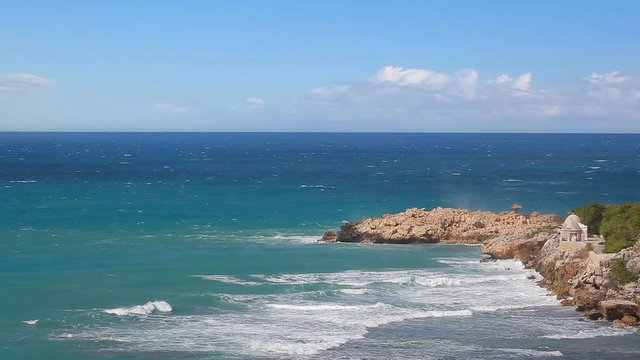 Ocean waves crashing in a rocky coast of Labadee, Haiti