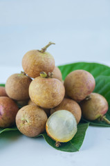 fruit or literally translated as Cat Eye Fruit , a subspecies of the Longan Fruit over white background.
