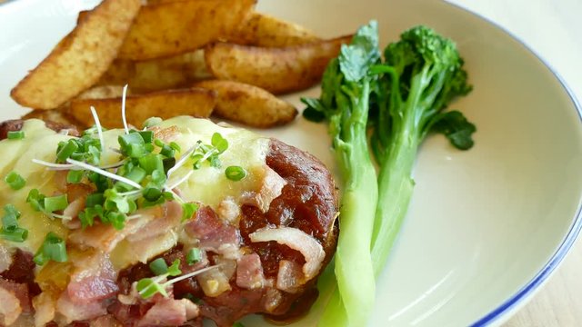 Chicken parmigiana with french fries

