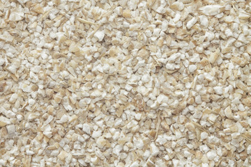 Barley groats background closeup