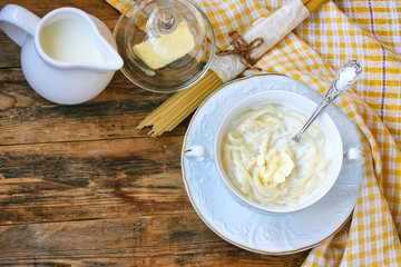 Sweet milk pasta in white bowl