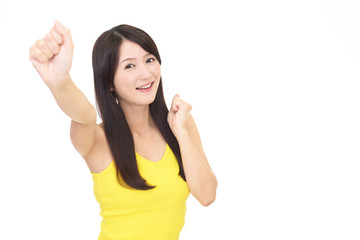 ガッツポーズの女性