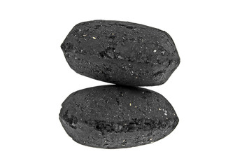 Charcoal briquettes on white background