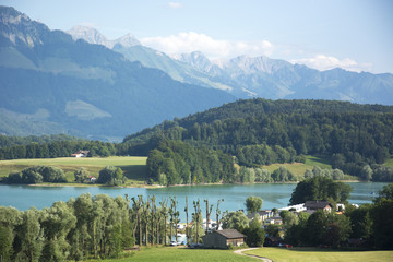A View of Lac de la Gruyère (Lake of Gruyère) in Switzerland on a Summer Day