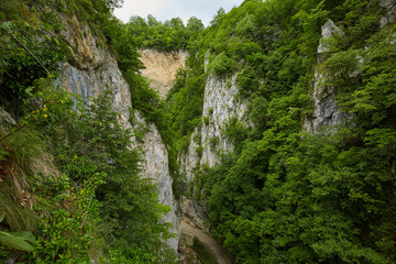 Mountain gravel road through canyon