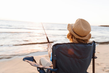 Teenage boy fishing at sea