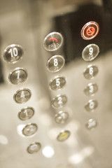 Elevator interior with modern design and pressing elevator buttons