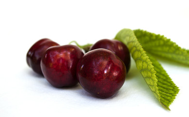 cherries on a white tablecloth