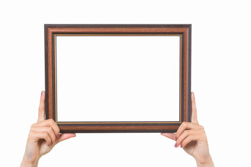 Frame in female hands on a white background