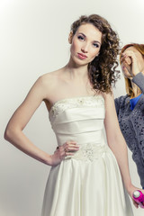 Hairdresser prepares model hair for shooting