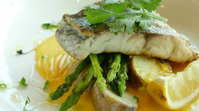 Fish steak with lemon and caper sauce
