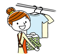 働くビジネスマンと洗濯を干す女性
