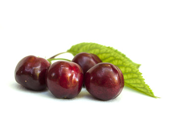 cherries on a white tablecloth