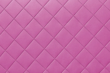 detail of pink sewn leather, pink leather upholstery background pattern