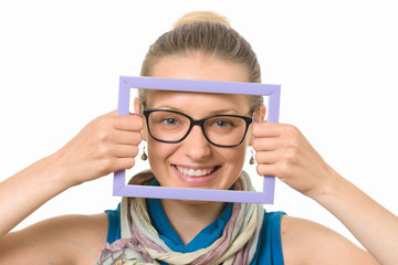 Beautiful girl in a picture frame on a white background.