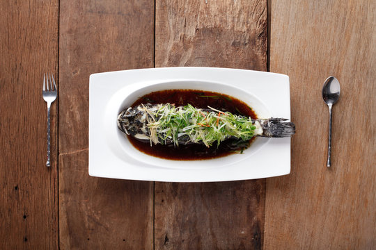 Sand goby steamed dish with chinese sauce,Ready to eat. On The Table
