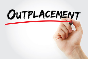 Hand writing Outplacement with marker, concept background