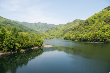 Fototapeta premium Dam Lake Pond Nature Cloud Sky Blue Winter White landscape Mountain close-up Japan Sunshine Sunset Sunrise Sunlight
