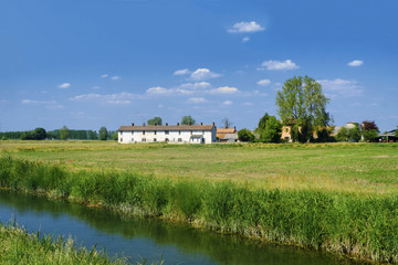 Bicycle lane along the Naviglio of Bereguardo (Italy): farm