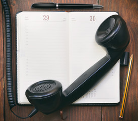 Old phone and address book with blank