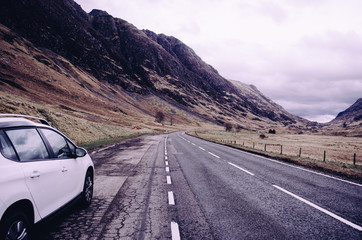 family trip with car in scotland - 159843590