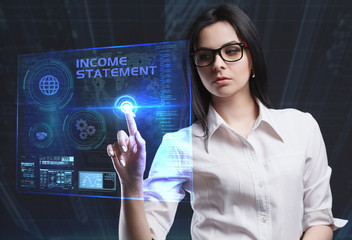 The concept of business, technology, the Internet and the network. A young entrepreneur working on a virtual screen of the future and sees the inscription: Income statement