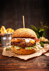 Delicious hamburger with cheese - obrazy, fototapety, plakaty