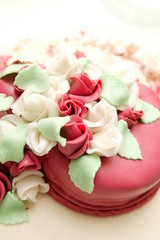 Fototapeta na wymiar wedding marzipan heart cake with roses
