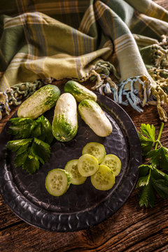 Whole and sliced cucumbers