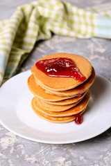 Deliciouse pancakes with raspberry jam for breakfast