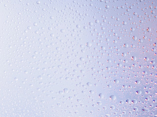 Water drops color background rain glass space rainbow.