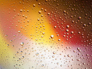 Water drops color background rain glass space rainbow.