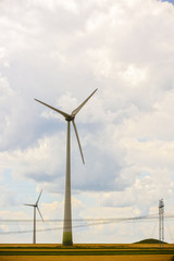 Fototapeta premium Landscape with an agricultural and wind farm in Romania
