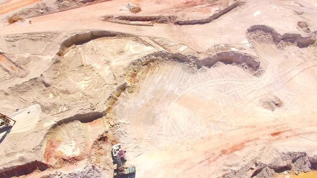 Kaznejov kaoline quarry. Camera flight over largest quarry of its kind in Europe. Heavy industry from above. Industrial area and devastated landscape in Czech Republic. 