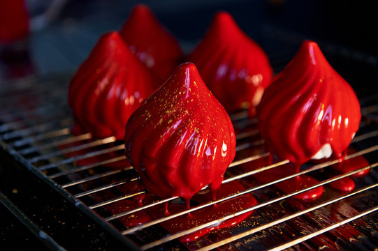 Fire berry cake, A delicate cream mousse, covered with incredibly shiny mirror-like glaze on the condensed milk, hides inside serdtsevinka of lemon jelly and ganache is incredibly useful oblepiha