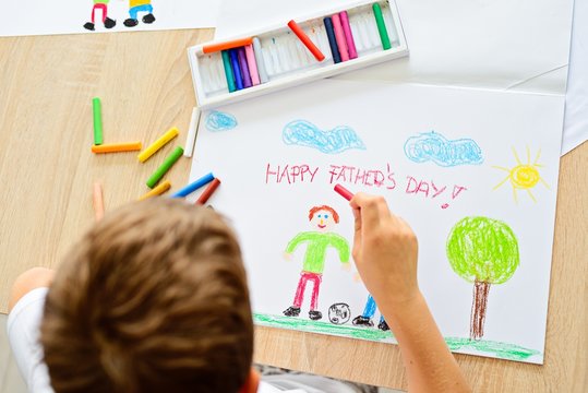 Child drawing and greeting card for his father