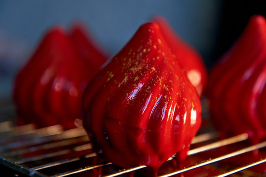 Fire berry cake, A delicate cream mousse, covered with incredibly shiny mirror-like glaze on the condensed milk, hides inside serdtsevinka of lemon jelly and ganache is incredibly useful oblepiha