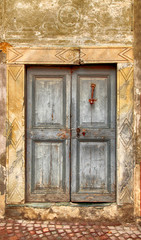 Vintage grey damaged wood medieval door