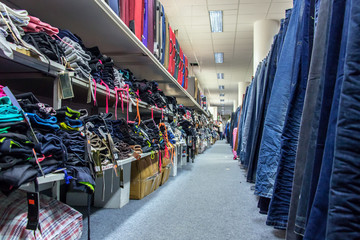 Shop with pants, clothing and bags.
