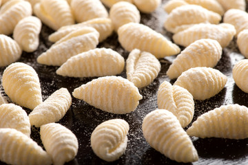 Fototapeta na wymiar Shells shape handmade pasta.