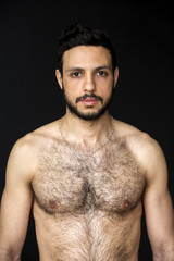 Fototapeta premium portrait of handsome shirtless hairy man