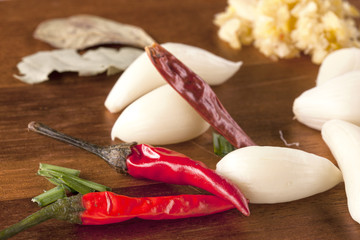 Close up of peppers and garlic.