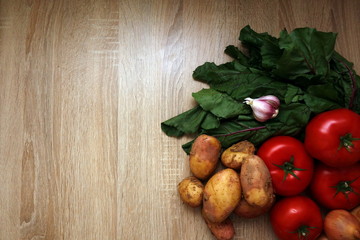 Ripe vegetables on rustic table 