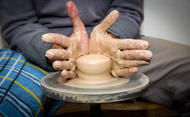 Obraz na płótnie Canvas hands of potter man