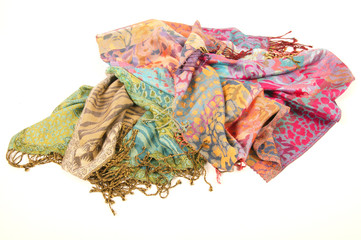 Still life of colorful scarves, draped on table, isolated neckerchief, Women Accessories