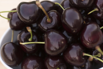White bolw  with ripe cherries