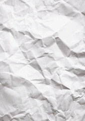 Wrinkled white vertical paper