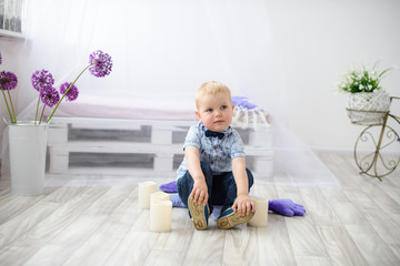 Fototapeta premium Small beautiful happy blonde boy smiling