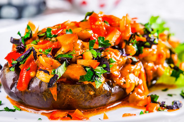 Stuffed eggplant with fried vegetables